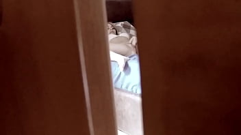 Spying behind a door a teen stepdaughter masturbating in bedroom