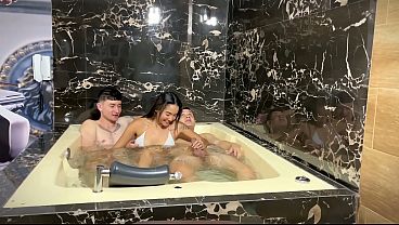 A YOUNG WHORE ENJOYS TWO BIG COCKS IN THE JACUZZI
