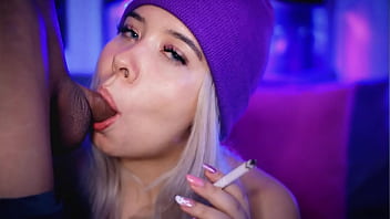 Colombian blonde gives her boyfriend a blowjob while smoking for