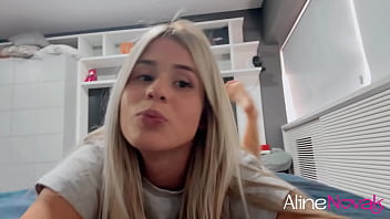 Busty blonde massaging her feet with oil and using her