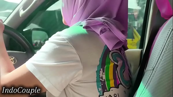 Indonesian Muslim Hijab wife Driving and sucking her Boyfriend Dick