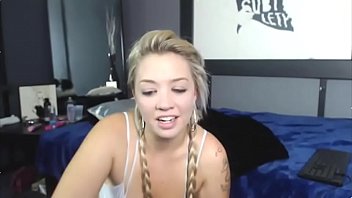 Young sexy blonde in pigtails uses A toy In Her