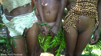 2 African tribe girl having fun with the village chief