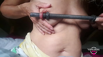 Nippleringlover kinky inserting 16mm rod in extreme stretched nipple piercings