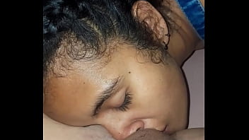 My stepsister sits on the bed while my girlfriend makes