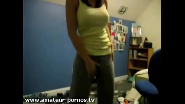 Cute busty girl strips off her clothes