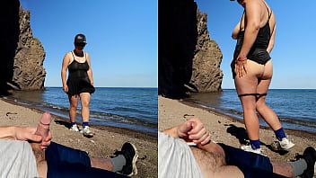 The stranger shocked the exhibitionist on the sea beach -