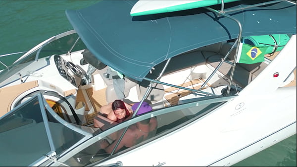 Drone captures couple having sex on a speedboat at sea