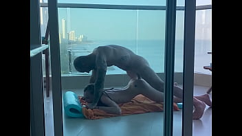 On a balcony in Cartagena, a young student gets her