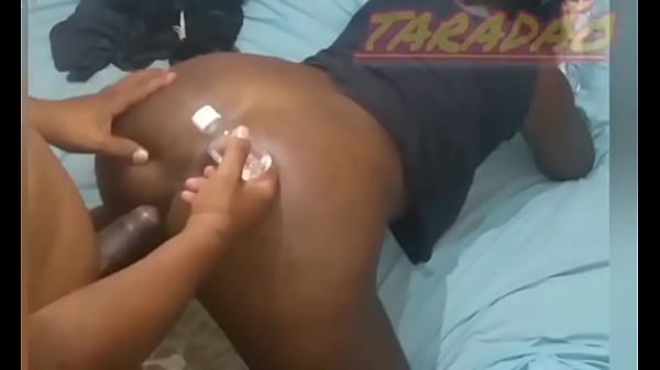 Pounding and cumming in the black woman's ass.
