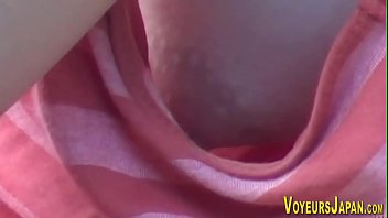 Asian babes side boob peeped on by voyeur