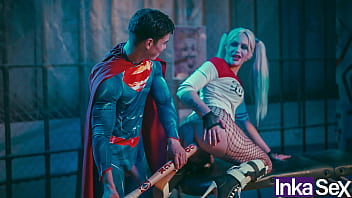 Superman inserts Harley Quinn's bat into his anus to save
