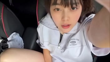 After taking a bath, a female college student masturbates on