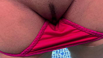 Married woman shows off in the pool before entering the