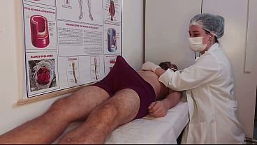 Patient gets an erection upon feeling the nurse's touch.