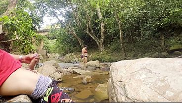 Unknown woman gives me a handjob in a river, fills