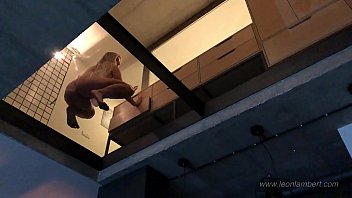 Voyeuring my Busty Wife from the glass bottom to see