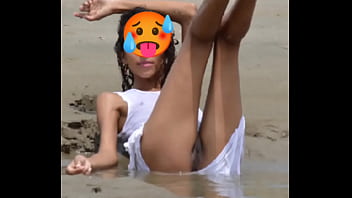 Nude model in a public beach photoshoot. Small tits nice