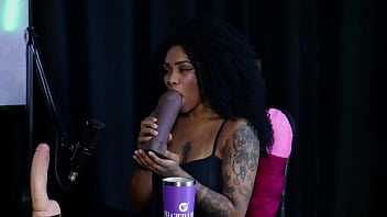 Slutty black girl shows her tits and demonstrates her blowjob
