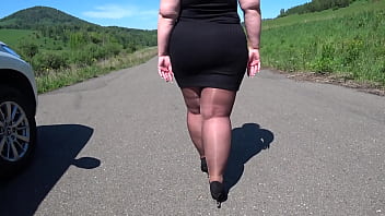 Mature BBW in nylon pantyhose and high heels walks down