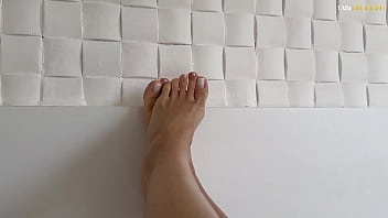 Hot MILF gives a FOOT massage with a dildo while