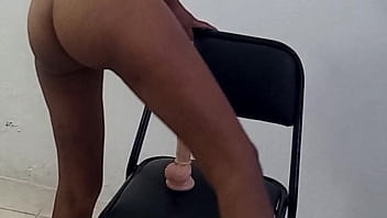 Beautiful Indian woman with natural tits masturbates on a chair