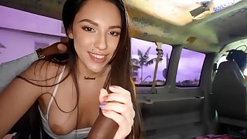 Beautiful amateur gives a blowjob in a van filmed by