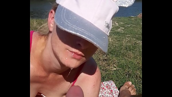 His wife sucks his dick while on the beach to