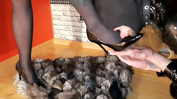 The slave worships the legs in pointed shoes. Shoes fetish.