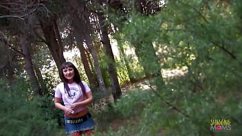 Photographer fucks a mature model in red fishnet stockings after