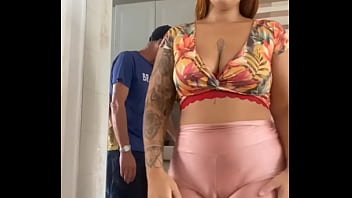 Married showing off with her husband nearby